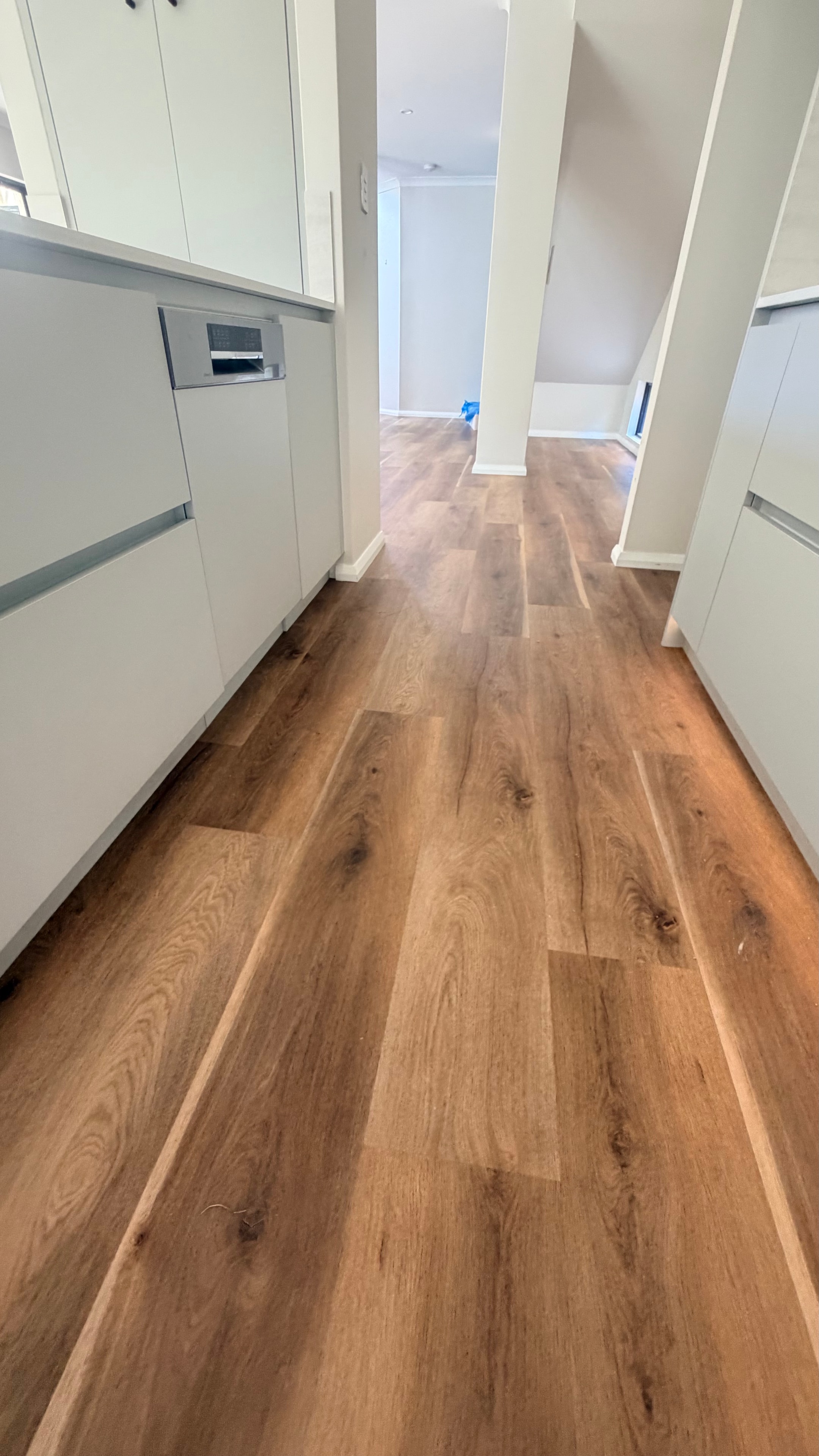 Luxury vinyl plank flooring in a contemporary living room